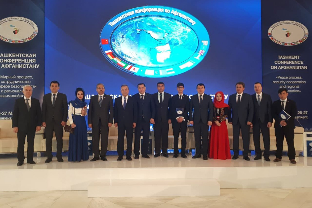 Female student on campus outdoors with a black top 