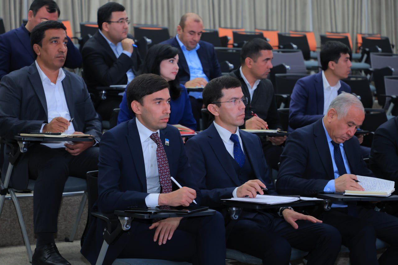 Female student on campus outdoors with a black top 