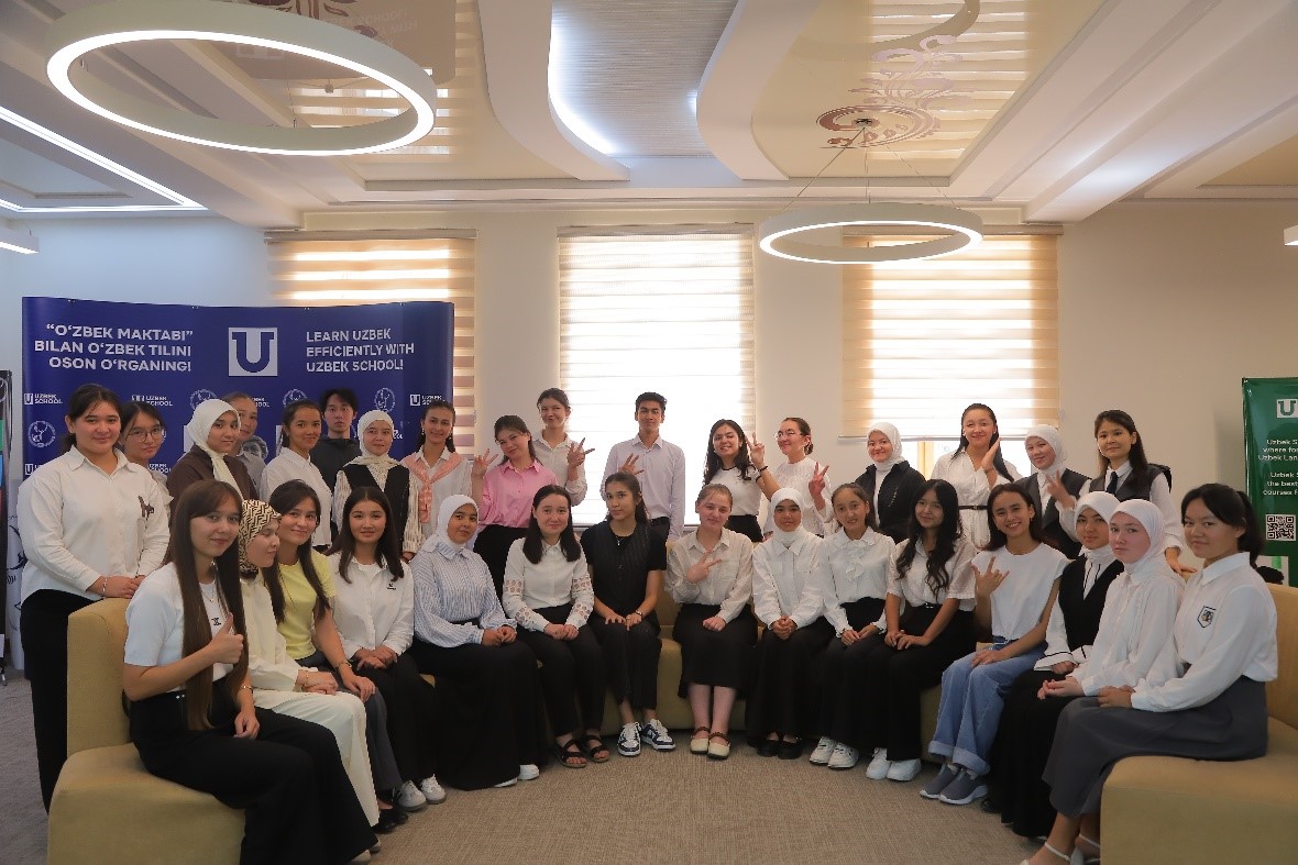 Female student on campus outdoors with a black top 